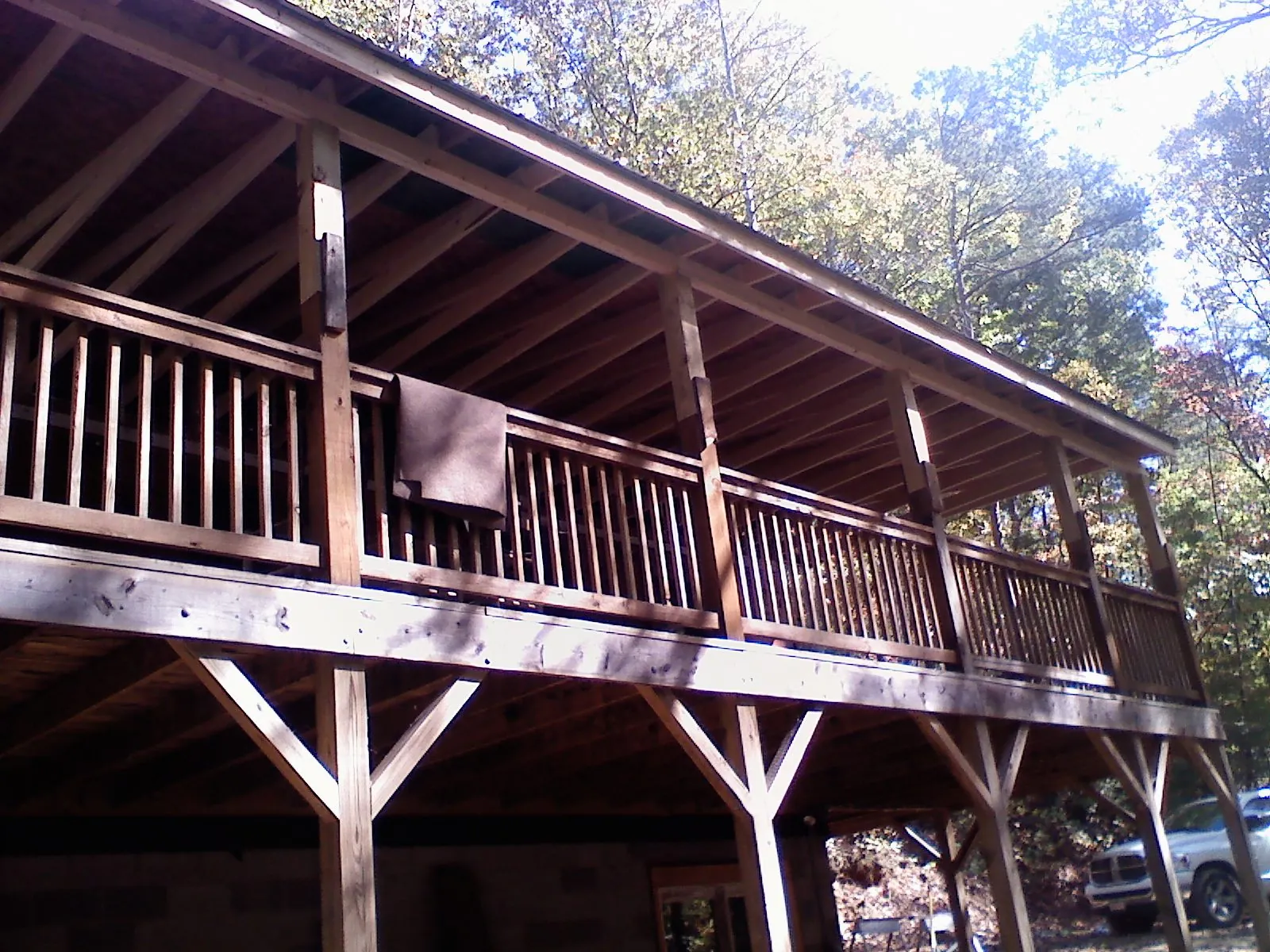Timber framing under a new elevated porch and deck — Roof Leak Repair in Elmhurst by Roofing Brothers
